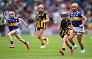 6 July 2025; Molly Mí Raghallaigh, Gaelscoil Uí Fhiaich, Maigh Nuad, Cill Dara, representing Kilkenny in action against Ella McDaid, St Aengus NS, Brigend, Donegal, representing Tipperary during the GAA INTO Cumann na mBunscol Respect Exhibition Go Games match at the GAA Hurling All-Ireland Senior Championship semi-final match between Kilkenny and Tipperary at Croke Park in Dublin. Photo by David Fitzgerald/Sportsfile