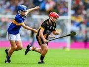 6 July 2025; Darragh McDonald, Dernakesh NS, Cootehill, Cavan, representing Kilkenny is tackled by Seán Allen, St Joseph's PS, Dungannon, Tyrone, representing Tipperary, during the GAA INTO Cumann na mBunscol Respect Exhibition Go Games match at the GAA Hurling All-Ireland Senior Championship semi-final match between Kilkenny and Tipperary at Croke Park in Dublin. Photo by Ray McManus/Sportsfile