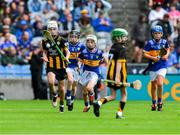 6 July 2025; Ethan Finnegan, Rathoe NS, Rathoe, Carlow, representing Kilkenny, in action against Martin O'Farrell, Primate Dixon PS, Coalisland, Tyrone, representing Tipperary, during the GAA INTO Cumann na mBunscol Respect Exhibition Go Games match at the GAA Hurling All-Ireland Senior Championship semi-final match between Kilkenny and Tipperary at Croke Park in Dublin. Photo by Ray McManus/Sportsfile