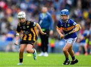 6 July 2025; Shea O'Kane, St Columba's PS, Kilrea, Derry, representing Kilkenny, in action against Daire McCawley, St Clare's NS, Manorhamilton, Leitrim, representing Tipperary, during the GAA INTO Cumann na mBunscol Respect Exhibition Go Games match at the GAA Hurling All-Ireland Senior Championship semi-final match between Kilkenny and Tipperary at Croke Park in Dublin. Photo by Ray McManus/Sportsfile