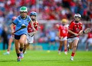 5 July 2025; Lainey O'Leary, Barntown N.S, Barntown, Wexford in action against Ella Hartnett, Tineteriffe N.S, Cappamore, Limerick, representing Cork and Cuisle Gillen, Bunscoil an tSléibhe Dhuibh, Béal Feirste, Antrim, representing Cork, during the GAA INTO Cumann na mBunscol Respect Exhibition Go Games match at the GAA Hurling All-Ireland Senior Championship semi-final match between Cork and Dublin at Croke Park in Dublin. Photo by Ray McManus/Sportsfile
