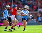 5 July 2025; Kirsty Hynes, Coolderry Central School, Coolderry, Offaly, representing Dublin and Ella Hartnett, Tineteriffe N.S, Cappamore, Limerick, representing Cork,during the GAA INTO Cumann na mBunscol Respect Exhibition Go Games match at the GAA Hurling All-Ireland Senior Championship semi-final match between Cork and Dublin at Croke Park in Dublin. Photo by Ray McManus/Sportsfile
