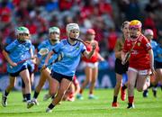 5 July 2025; Kirsty Hynes, Coolderry Central School, Coolderry, Offaly, representing Dublin, in action against Orla McGrogan, Millquarter P.S, Toome, Antrim, representing Cork, during the GAA INTO Cumann na mBunscol Respect Exhibition Go Games match at the GAA Hurling All-Ireland Senior Championship semi-final match between Cork and Dublin at Croke Park in Dublin. Photo by Ray McManus/Sportsfile