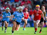 5 July 2025; Kirsty Hynes, Coolderry Central School, Coolderry, Offaly, representing Dublin, in action against Orla McGrogan, Millquarter P.S, Toome, Antrim, representing Cork, during the GAA INTO Cumann na mBunscol Respect Exhibition Go Games match at the GAA Hurling All-Ireland Senior Championship semi-final match between Cork and Dublin at Croke Park in Dublin. Photo by Ray McManus/Sportsfile