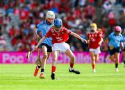 5 July 2025; Amy Gillespie, Ballinamere N.S, Ballinamere, Offaly, representing Dublin, is tackled by Aoibheann Burke, Cregmore N.S, Claregalway, Galway, representing Cork, during the GAA INTO Cumann na mBunscol Respect Exhibition Go Games match at the GAA Hurling All-Ireland Senior Championship semi-final match between Cork and Dublin at Croke Park in Dublin. Photo by Ray McManus/Sportsfile