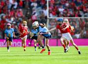 5 July 2025; Amy Gillespie, Ballinamere N.S, Ballinamere, Offaly, representing Dublin, is tackled by Aoibheann Burke, Cregmore N.S, Claregalway, Galway, representing Cork, during the GAA INTO Cumann na mBunscol Respect Exhibition Go Games match at the GAA Hurling All-Ireland Senior Championship semi-final match between Cork and Dublin at Croke Park in Dublin. Photo by Ray McManus/Sportsfile