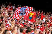 5 July 2025; Cork supporters, in the Cusack Stand, celebrate a score during the GAA Hurling All-Ireland Senior Championship semi-final match between Cork and Dublin at Croke Park in Dublin. Photo by Ray McManus/Sportsfile