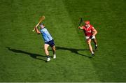 5 July 2025; Sean Currie of Dublin in action against Ciarán Joyce of Cork during the GAA Hurling All-Ireland Senior Championship semi-final match between Cork and Dublin at Croke Park in Dublin. Photo by Stephen McCarthy/Sportsfile