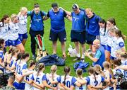 5 July 2025; Waterford manager Michael Boland speaks to his players and staff from inside their huddle during the Glen Dimplex Senior All-Ireland Camogie Championship quarter-final match between Clare and Waterford at Croke Park in Dublin. Photo by Stephen McCarthy/Sportsfile