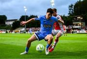 4 July 2025; James Clarke of Bohemians in action against Barry Baggley of St Patrick's Athletic during the SSE Airtricity Men's Premier Division match between St Patrick's Athletic and Bohemians at Richmond Park in Dublin. Photo by Stephen McCarthy/Sportsfile
