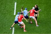 5 July 2025; Referee Johnny Murphy throws the sliothár in between Conor Burke, 6, Brian Hayes, 9 of Dublin, Tim O'Mahony, 8 and Darragh Fitzgibbon, 9, of Cork to start the GAA Hurling All-Ireland Senior Championship semi-final match between Cork and Dublin at Croke Park in Dublin. Photo by Stephen McCarthy/Sportsfile