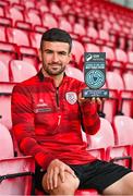 9 July 2025; Michael Duffy of Derry City poses for a portrait with his SSE Airtricity / SWI Player of the Month Award for June 2025 at Dungiven in Derry. Photo by Oliver McVeigh/Sportsfile