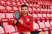 9 July 2025; Michael Duffy of Derry City poses for a portrait with his SSE Airtricity / SWI Player of the Month Award for June 2025 at Dungiven in Derry. Photo by Oliver McVeigh/Sportsfile