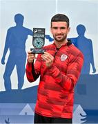 9 July 2025; Michael Duffy of Derry City poses for a portrait with his SSE Airtricity / SWI Player of the Month Award for June 2025 at Dungiven in Derry. Photo by Oliver McVeigh/Sportsfile