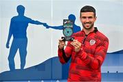 9 July 2025; Michael Duffy of Derry City poses for a portrait with his SSE Airtricity / SWI Player of the Month Award for June 2025 at Dungiven in Derry. Photo by Oliver McVeigh/Sportsfile