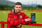 9 July 2025; Michael Duffy of Derry City poses for a portrait with his SSE Airtricity / SWI Player of the Month Award for June 2025 at Dungiven in Derry. Photo by Oliver McVeigh/Sportsfile