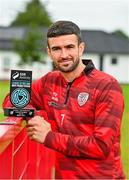 9 July 2025; Michael Duffy of Derry City poses for a portrait with his SSE Airtricity / SWI Player of the Month Award for June 2025 at Dungiven in Derry. Photo by Oliver McVeigh/Sportsfile
