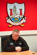 7 July 2025; Cork manager Pat Ryan checks his watch as he waits for the start of a Cork Hurling media conference at SuperValu Páirc Uí Chaoimh in Cork ahead of the GAA Hurling All-Ireland Senior Championship Final. Photo by Piaras Ó Mídheach/Sportsfile