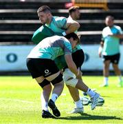 8 July 2025; Nick Timoney is tackled by Ryan Baird during an Ireland Rugby squad training at the Grupo Desportivo Direito in Lisbon, Portugal. Photo by Carlos Rodrigues/Sportsfile
