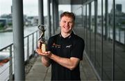 8 July 2025; PwC GAA/GPA Player of the Month for June in hurling, Conor Burke of Dublin, with his award at PwC offices in Dublin. Photo by Tyler Miller/Sportsfile