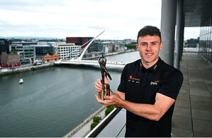 8 July 2025; PwC GAA/GPA Player of the Month for June in football, Jordan Morris of Meath, with his award at PwC offices in Dublin. Photo by Tyler Miller/Sportsfile