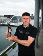 8 July 2025; PwC GAA/GPA Player of the Month for June in football, Jordan Morris of Meath, with his award at PwC offices in Dublin. Photo by Tyler Miller/Sportsfile