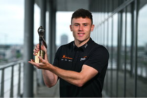 8 July 2025; PwC GAA/GPA Player of the Month for June in football, Jordan Morris of Meath, with his award at PwC offices in Dublin. Photo by Tyler Miller/Sportsfile
