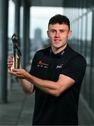 8 July 2025; PwC GAA/GPA Player of the Month for June in football, Jordan Morris of Meath, with his award at PwC offices in Dublin. Photo by Tyler Miller/Sportsfile