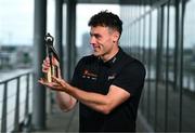 8 July 2025; PwC GAA/GPA Player of the Month for June in football, Jordan Morris of Meath, with his award at PwC offices in Dublin. Photo by Tyler Miller/Sportsfile