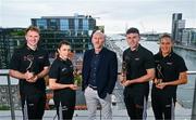 8 July 2025; PwC GAA/GPA Players of the Month for June, from left, in hurling, Conor Burke of Dublin, in camogie, Niamh Mallon of Galway, in football, Jordan Morris of Meath, and in ladies’ football, Emma Murray of Waterford with PWC partner Ronan Finn and their awards at PwC offices in Dublin. Photo by Tyler Miller/Sportsfile