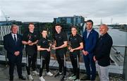 8 July 2025; PwC GAA/GPA Players of the Month for June, from left, in hurling, Conor Burke of Dublin, in camogie, Niamh Mallon of Galway, in football, Jordan Morris of Meath, and in ladies’ football, Emma Murray of Waterford with from left, Ulster GAA President Michael Geoghegan, Tom Parsons, CEO of the GPA and PWC Partner Ronan Finn and their awards at PwC offices in Dublin. Photo by Tyler Miller/Sportsfile