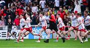 6 July 2025; Tyrone players and management celebrate after the Electric Ireland GAA Football All-Ireland Minor Championship final match between Kerry and Tyrone at Cedral St Conleth's Park in Newbridge, Kildare. Photo by Piaras Ó Mídheach/Sportsfile