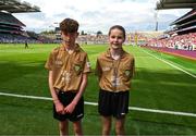 5 July 2025; Referees Darragh Burke, Lackagh N.S, Turloughmore, Galway and Chloe Carrol, Ardrahan N.S, Ardrahan, Galwa, before the GAA INTO Cumann na mBunscol Respect Exhibition Go Games at the GAA Hurling All-Ireland Senior Championship semi-final match between Cork and Dublin at Croke Park in Dublin. Photo by Ray McManus/Sportsfile