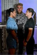 8 July 2025; Katie Taylor, right, and Amanda Serrano face-off with Jake Paul, co-Founder of Most Valuable Promotions, on the staircase during a lighting up of the Empire State Building, in New York, USA, to kick off Taylor v Serrano 3 fight week ahead of their undisputed super lightweight championship fight that will take place at Madison Square Garden in New York on Friday, 11th July. Additionally, in honor of the historic trilogy fight, the Empire State Building will shine its world-famous tower lights in the colors of Taylor’s and Serrano’s homelands – green, white and orange to represent the Irish flag and blue, white and red to represent the Puerto Rican flag – on fight night. Photo by Stephen McCarthy/Sportsfile