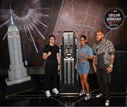 8 July 2025; Katie Taylor, left, and Amanda Serrano with Jake Paul, co-Founder of Most Valuable Promotions, during a lighting up of the Empire State Building, in New York, USA, to kick off Taylor v Serrano 3 fight week ahead of their undisputed super lightweight championship fight that will take place at Madison Square Garden in New York on Friday, 11th July. Additionally, in honor of the historic trilogy fight, the Empire State Building will shine its world-famous tower lights in the colors of Taylor’s and Serrano’s homelands – green, white and orange to represent the Irish flag and blue, white and red to represent the Puerto Rican flag – on fight night. Photo by Stephen McCarthy/Sportsfile