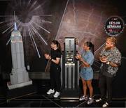 8 July 2025; Katie Taylor, left, and Amanda Serrano with Jake Paul, co-Founder of Most Valuable Promotions, during a lighting up of the Empire State Building, in New York, USA, to kick off Taylor v Serrano 3 fight week ahead of their undisputed super lightweight championship fight that will take place at Madison Square Garden in New York on Friday, 11th July. Additionally, in honor of the historic trilogy fight, the Empire State Building will shine its world-famous tower lights in the colors of Taylor’s and Serrano’s homelands – green, white and orange to represent the Irish flag and blue, white and red to represent the Puerto Rican flag – on fight night. Photo by Stephen McCarthy/Sportsfile