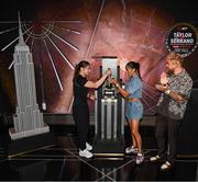 8 July 2025; Katie Taylor, left, and Amanda Serrano with Jake Paul, co-Founder of Most Valuable Promotions, during a lighting up of the Empire State Building, in New York, USA, to kick off Taylor v Serrano 3 fight week ahead of their undisputed super lightweight championship fight that will take place at Madison Square Garden in New York on Friday, 11th July. Additionally, in honor of the historic trilogy fight, the Empire State Building will shine its world-famous tower lights in the colors of Taylor’s and Serrano’s homelands – green, white and orange to represent the Irish flag and blue, white and red to represent the Puerto Rican flag – on fight night. Photo by Stephen McCarthy/Sportsfile