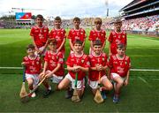 5 July 2025; The Cork team pose for a group photo, back row, left to right, Cillian Cunningham, Dernakesh N.S, Cootehill, Cavan, Gerard Connor, Scoil Mhuire na mBuachaillí, Castlebayney, Monaghan, Oisín Rice,Scoil Mhuire, Latton, Monaghan, Davin Finn, St Ciarán’s N.S, Moore, Roscommon, and Finnian O’Connor, Cliffoney N.S, Cliffoney, Sligo, front row, Cian Connell, St Mary’s N.S, Edgeworthstown, Longford, Joshua Hill, St Ronan’s P.S, Lisnaskea, Fermanagh, Connla Gilligan, Scoil An Choimín, Cloghan, Donegal, Robbie Mallon, St Mary’s Ballygunner, Waterford City, Waterford, and Tommy Houlihan, Bunscoil Bhothar na Naomh, Lismore, Waterford, before the GAA INTO Cumann na mBunscol Respect Exhibition Go Games at the GAA Hurling All-Ireland Senior Championship semi-final match between Cork and Dublin at Croke Park in Dublin. Photo by Ray McManus/Sportsfile