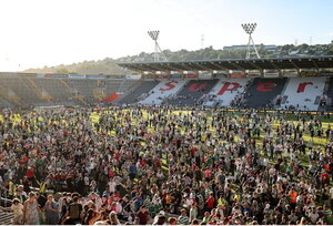 8 July 2025; Supporters run onto the pitch after the Cork Super Cup match between Cork City and Celtic FC at SuperValu Páirc Uí Chaoimh in Cork. Photo by Thomas Flinkow/Sportsfile