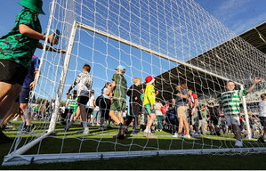 8 July 2025; Supporters run onto the pitch after the Cork Super Cup match between Cork City and Celtic FC at SuperValu Páirc Uí Chaoimh in Cork. Photo by Thomas Flinkow/Sportsfile