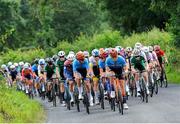 8 July 2025; Hot Tubes team lead the peloton during Stage 1 of 2025 Junior Tour of Ireland from Ennis to Barefield. Photo by Stephen McMahon/Sportsfile