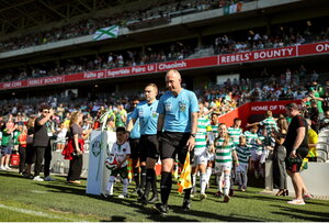 8 July 2025; Match officials and players enter the pitch before the Cork Super Cup match between Cork City and Celtic FC at SuperValu Páirc Uí Chaoimh in Cork. Photo by Thomas Flinkow/Sportsfile