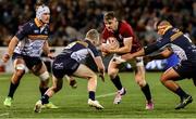 9 July 2025; Garry Ringrose of British & Irish Lions in action against ACT Brumbies players Ryan Lonergan, left, and Lington Ieli during the tour match between ACT Brumbies and the British & Irish Lions at GIO Stadium in Canberra, Australia. Photo by Steve Christo/Sportsfile