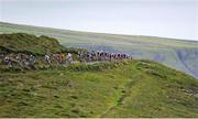 9 July 2025; A general view of the peloton during Stage 2 of 2025 Junior Tour of Ireland from Ennis to Kilkee. Photo by Stephen McMahon/Sportsfile