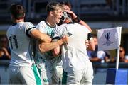 9 July 2025; Oisin Minogue of Ireland, black scrum cap, is embraced by his team mates after scoring a try in the World Rugby U20 Championship 2025 Pool C match between Ireland and New Zealand at Stadio San Michele in Calvisano, Italy. Photo by Massimiliano Carnabuci/Sportsfile