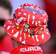 9 July 2025; A detailed view of the pins on a Shelbourne supporters hat before the UEFA Champions League First Qualifying Round first leg match between Shelbourne and Linfield at Tolka Park in Dublin. Photo by Ben McShane/Sportsfile