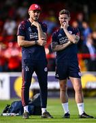 9 July 2025; Shelbourne head coach Joey O'Brien, left, and  Shelbourne technical director Luke Byrne during the UEFA Champions League First Qualifying Round first leg match between Shelbourne and Linfield at Tolka Park in Dublin. Photo by Ben McShane/Sportsfile