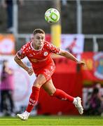 9 July 2025; Evan Caffrey of Shelbourne heads on goal during the UEFA Champions League First Qualifying Round first leg match between Shelbourne and Linfield at Tolka Park in Dublin. Photo by Seb Daly/Sportsfile