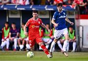 9 July 2025; Ali Coote of Shelbourne in action against Josh Archer of Linfield during the UEFA Champions League First Qualifying Round first leg match between Shelbourne and Linfield at Tolka Park in Dublin. Photo by Ben McShane/Sportsfile