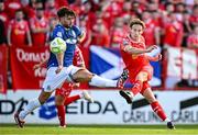 9 July 2025; Harry Wood of Shelbourne in action against Euan East of Linfield during the UEFA Champions League First Qualifying Round first leg match between Shelbourne and Linfield at Tolka Park in Dublin. Photo by Seb Daly/Sportsfile